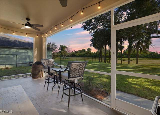 Property at 321 Shadow Lakes Dr, Lehigh Acres, FL 33974, 4 beds, 3 baths