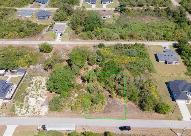 Property at 853 Wolverine St E, Lehigh Acres, FL 33974