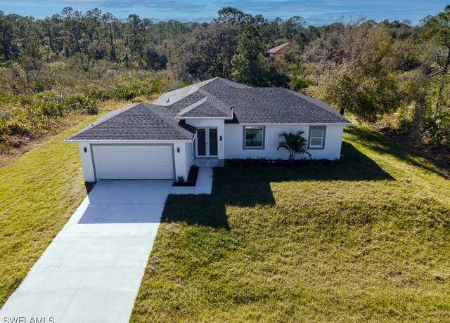 Property at 805 W 14th St, Lehigh Acres, FL 33972, 3 beds, 2 baths