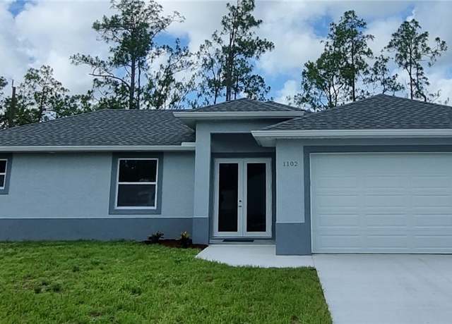 Property at 1102 E 15th St, Lehigh Acres, FL 33972, 3 beds, 2 baths
