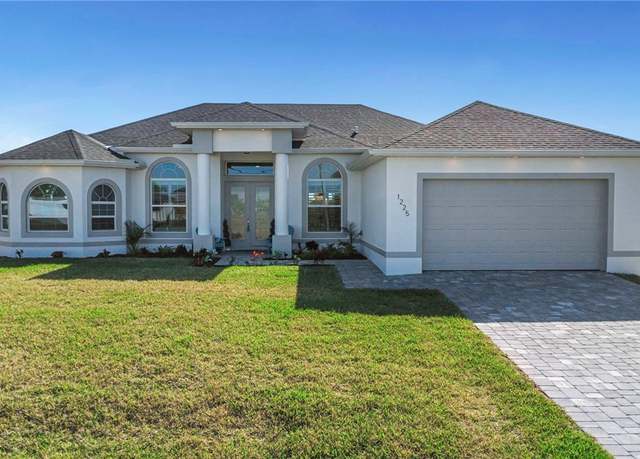 Property at 1225 NW 33rd Ave, Cape Coral, FL 33993, 4 beds, 3 baths