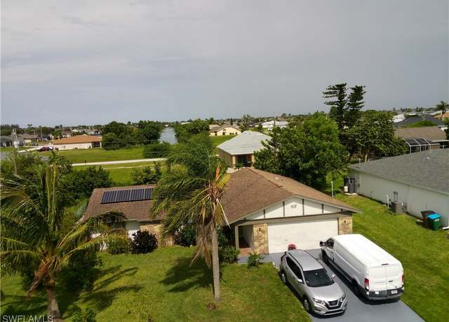 Property at 1409 NW 7th Pl, Cape Coral, FL 33993, 3 beds, 2 baths