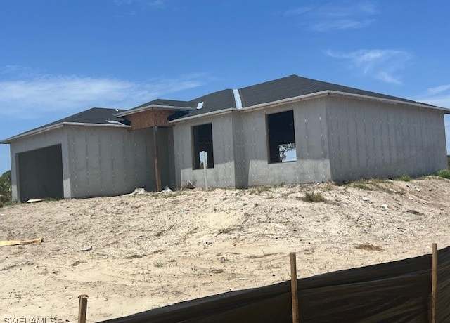 Property at 861 Newell St E, Lehigh Acres, FL 33974, 3 beds, 2 baths