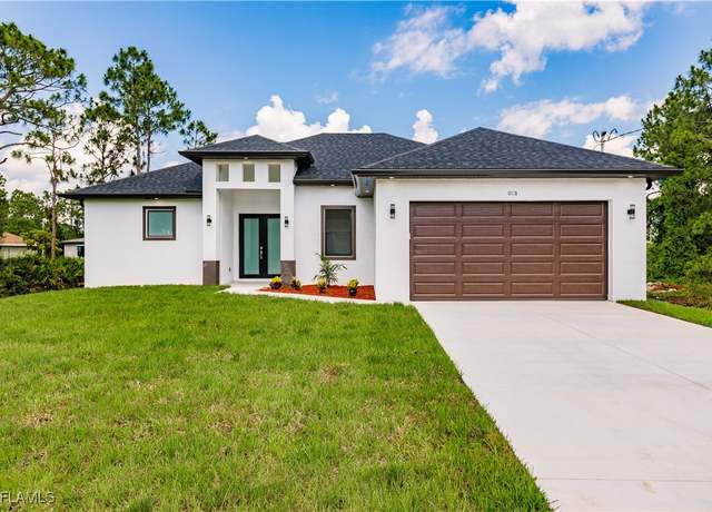 Property at 3005 28th St SW, Lehigh Acres, FL 33976, 3 beds, 2.5 baths