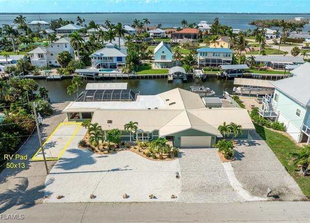 Property at 3631 Emerald Ave, St. James City, FL 33956, 4 beds, 3 baths