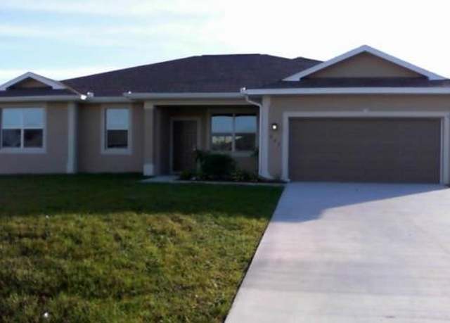 Property at 802 Felix Ave N, Lehigh Acres, FL 33971, 3 beds, 3 baths