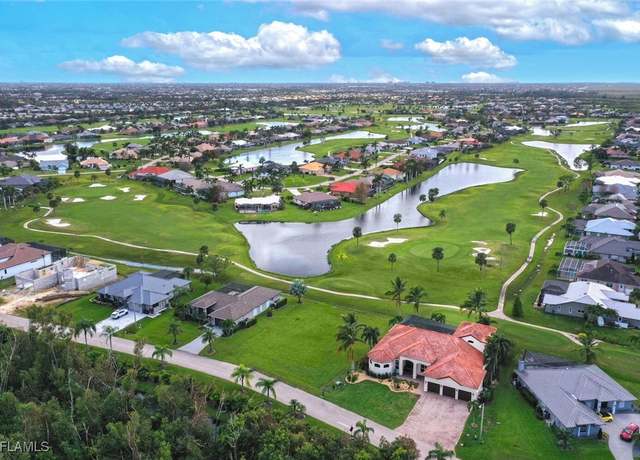 Property at 11970 Royal Tee Cir, Cape Coral, FL 33991, 4 beds, 3.5 baths