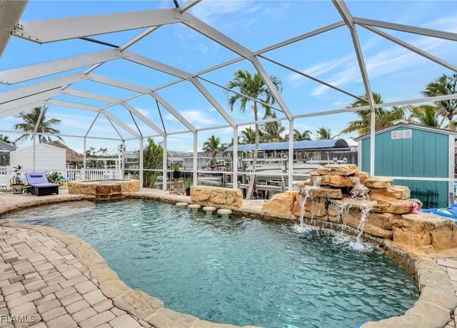 Property at 2499 Sapodilla Ln, St. James City, FL 33956, 3 beds, 2 baths
