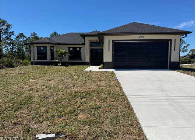Property at 2101 W 9th St, Lehigh Acres, FL 33972, 3 beds, 2 baths