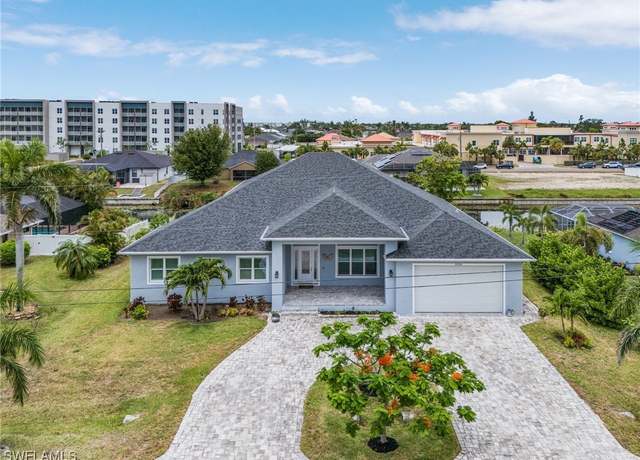 Property at 2228 SW 15th Ave, Cape Coral, FL 33991, 4 beds, 3.5 baths