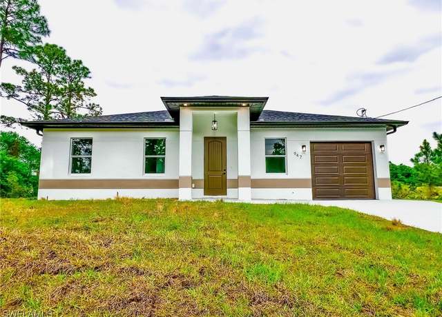 Property at 947 Barcelona St E, Lehigh Acres, FL 33974, 3 beds, 3 baths