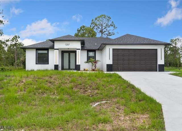 Property at 1207 W 9th St, Lehigh Acres, FL 33972, 3 beds, 2 baths