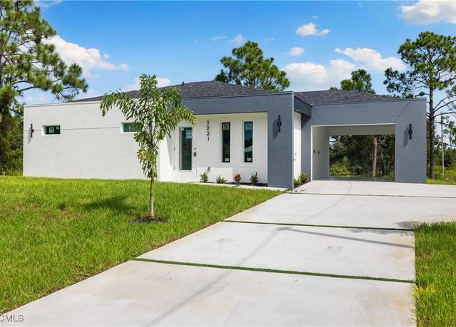 Property at 1221 Ederle St E, Lehigh Acres, FL 33974, 3 beds, 2 baths