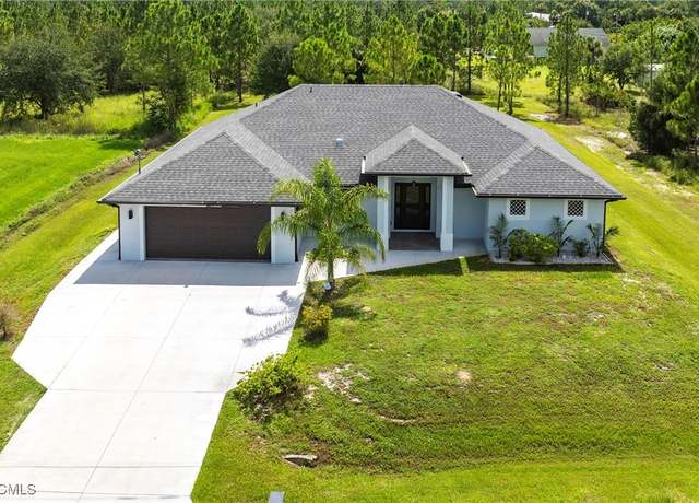 Property at 912 Thompson Ave, Lehigh Acres, FL 33972, 4 beds, 3.5 baths