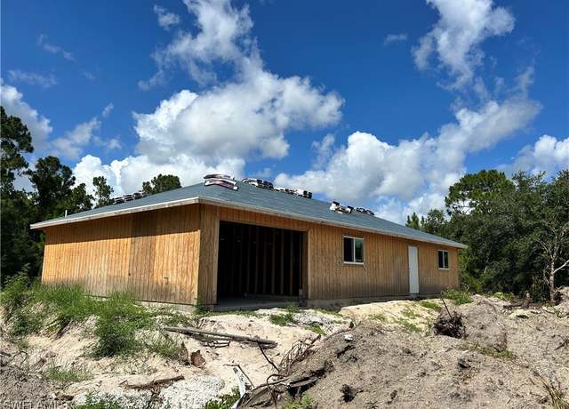 Property at 1305 W 18th St, Lehigh Acres, FL 33972, 3 beds, 2 baths