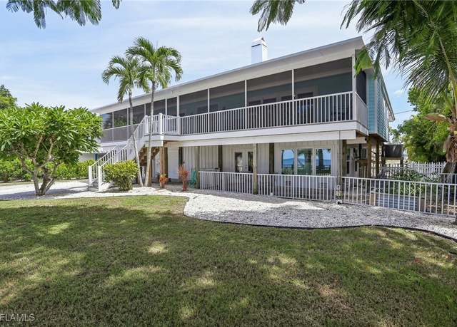 Property at 8335 Main St, Bokeelia, FL 33922, 3 beds, 2 baths