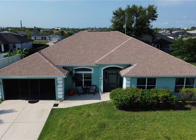 Property at 122 NW 7th Ter, Cape Coral, FL 33993, 4 beds, 3 baths