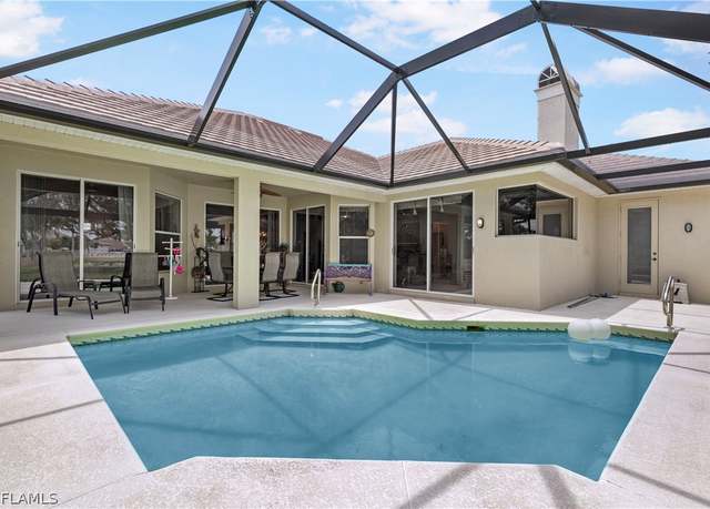Property at 1911 Lagoon Ln, Cape Coral, FL 33914, 4 beds, 3 baths