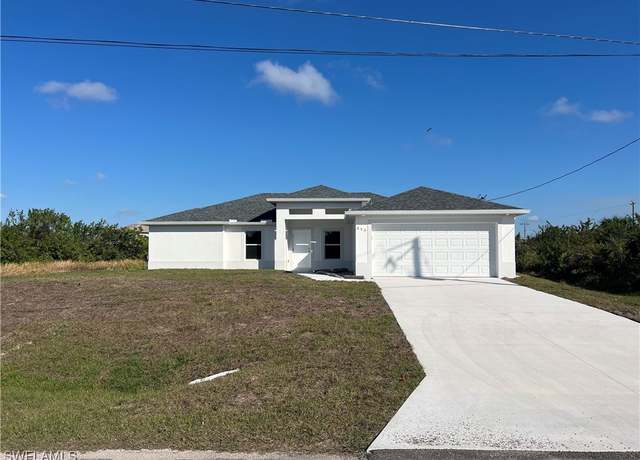 Property at 653 Theodore Vail St E, Lehigh Acres, FL 33974, 4 beds, 2 baths