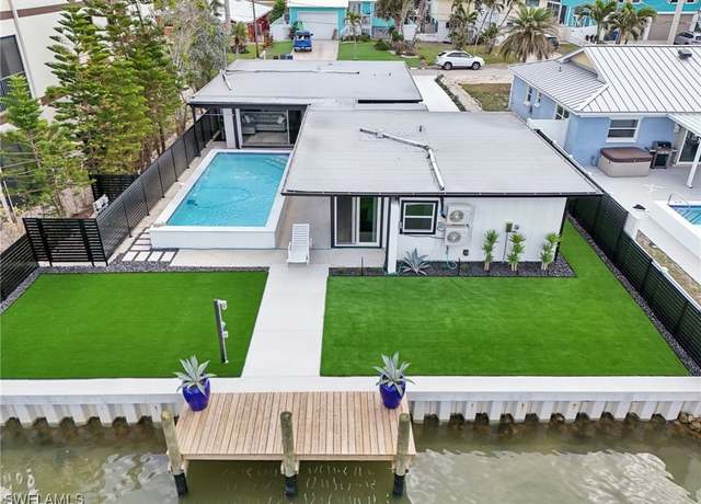 Property at 239 Curlew St, Fort Myers Beach, FL 33931, 4 beds, 3 baths