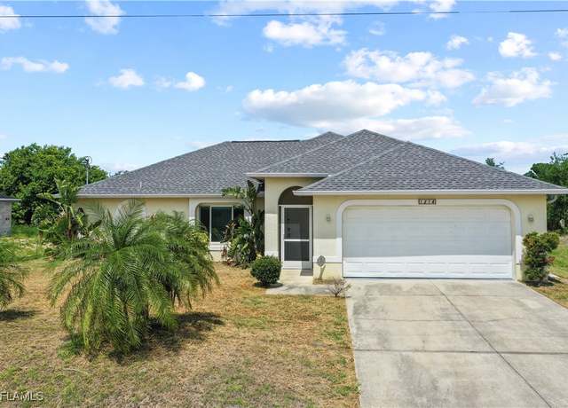 Property at 1214 NE 14th Ave, Cape Coral, FL 33909, 4 beds, 2 baths