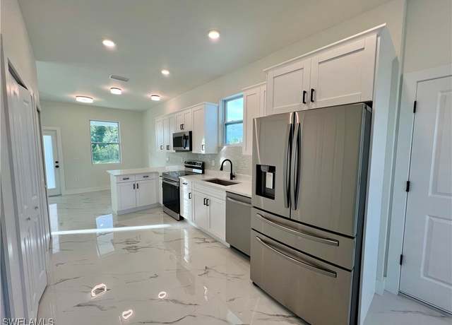 Property at 4002 E 17th St, Lehigh Acres, FL 33972, 3 beds, 2 baths