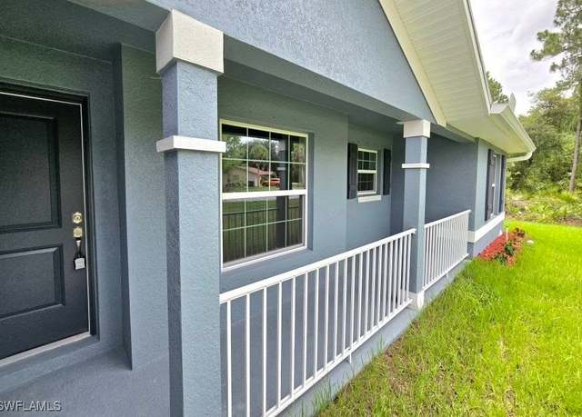 Property at 3102 E 2nd St, Lehigh Acres, FL 33936, 3 beds, 2 baths