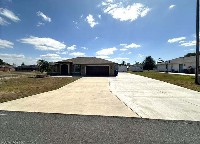 Property at 401 Candlewick Cir E, Lehigh Acres, FL 33936, 3 beds, 3 baths
