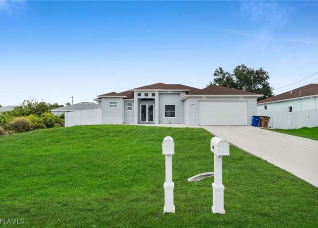 Property at 2902 9th St SW, Lehigh Acres, FL 33976, 3 beds, 2 baths