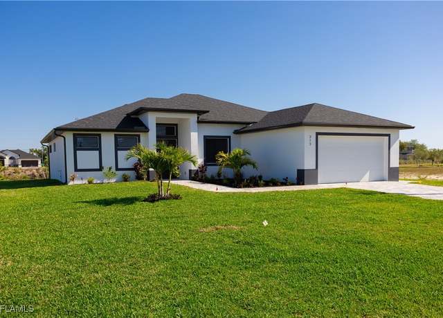 Property at 313 NE 5th Ter, Cape Coral, FL 33909, 4 beds, 3 baths