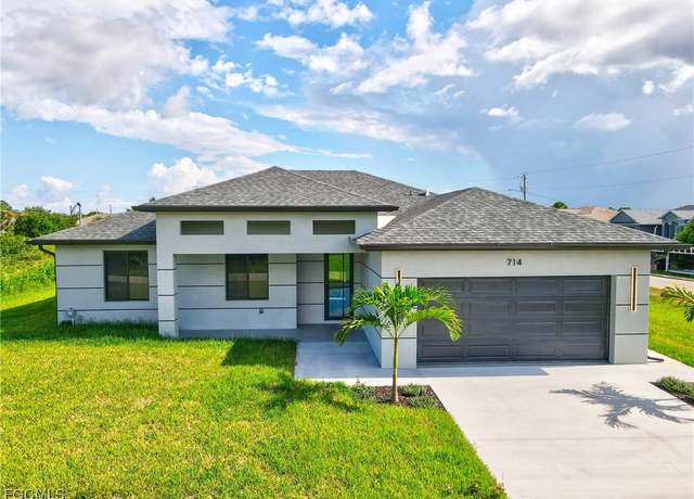 Property at 714 Cane St E, Lehigh Acres, FL 33974, 4 beds, 3 baths