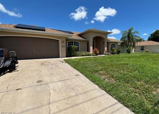 Property at 1203 Ermine St E, Lehigh Acres, FL 33974, 3 beds, 2 baths