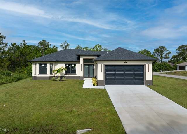 Property at 2101 W 9th St, Lehigh Acres, FL 33972, 3 beds, 2 baths