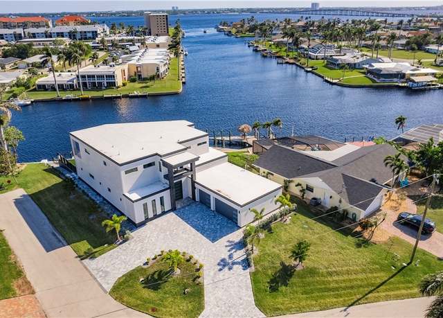 Property at 4301 SE 18th Pl, Cape Coral, FL 33904, 4 beds, 5 baths