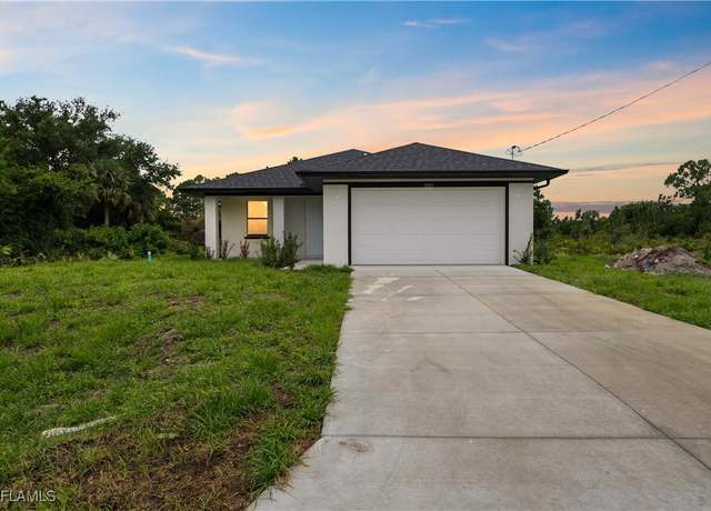 Property at 2703 54th St W, Lehigh Acres, FL 33971, 3 beds, 2 baths