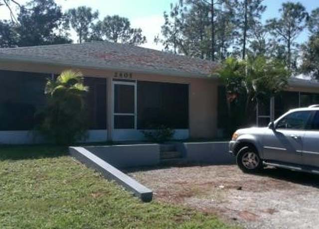 Property at 2405/2407 George Ave S, Lehigh Acres, FL 33973, 6 beds, 4 baths