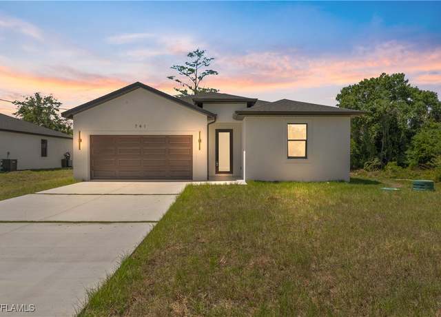 Property at 741 Woodcrest Dr, Lehigh Acres, FL 33972, 3 beds, 2 baths