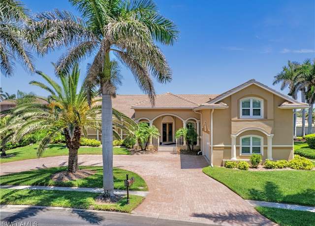 Property at 15600 Catalpa Cove Dr, Fort Myers, FL 33908, 4 beds, 3.5 baths