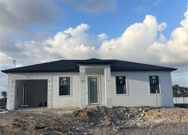 Property at 1215 Ecarte St E, Lehigh Acres, FL 33974, 3 beds, 3 baths