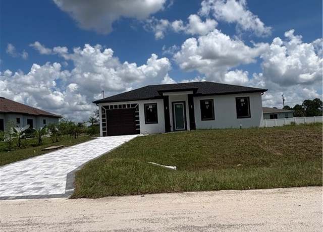 Property at 1215 Ecarte St E, Lehigh Acres, FL 33974, 3 beds, 3 baths