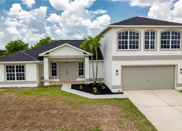 Property at 806 Douglas Ave N, Lehigh Acres, FL 33971, 5 beds, 3 baths