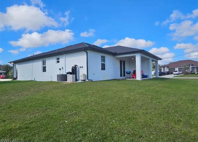 Property at 2412/2414 Delta Ave N, Lehigh Acres, FL 33971, 5 beds, 4 baths