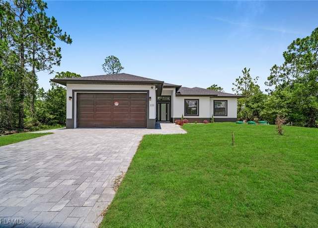 Property at 233 Narcissus Ave S, Lehigh Acres, FL 33974, 3 beds, 2 baths