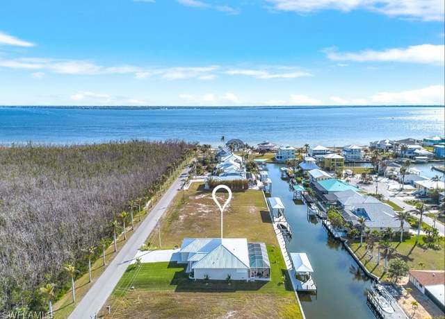 Property at 2401 Macadamia Ln, St. James City, FL 33956, 3 beds, 2 baths
