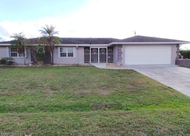 Property at 1408 Archer St, Lehigh Acres, FL 33936, 4 beds, 3 baths