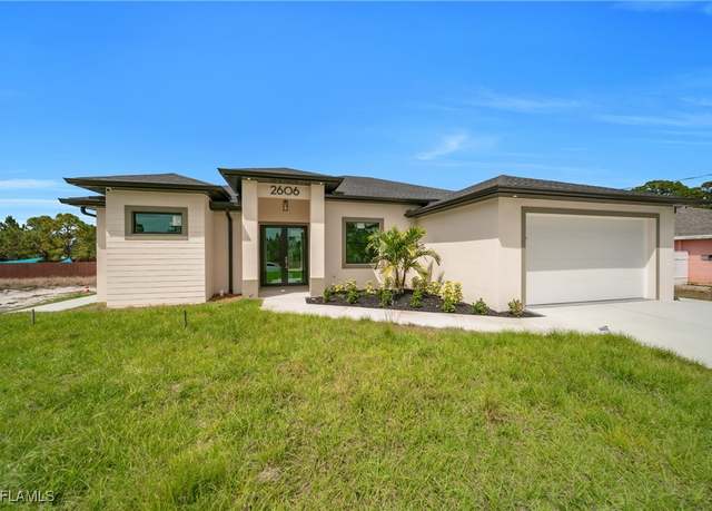 Property at 2606 34th St SW, Lehigh Acres, FL 33976, 4 beds, 3 baths