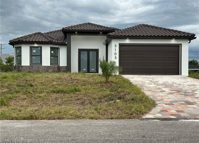 Property at 3103 13th St SW, Lehigh Acres, FL 33976, 4 beds, 2 baths