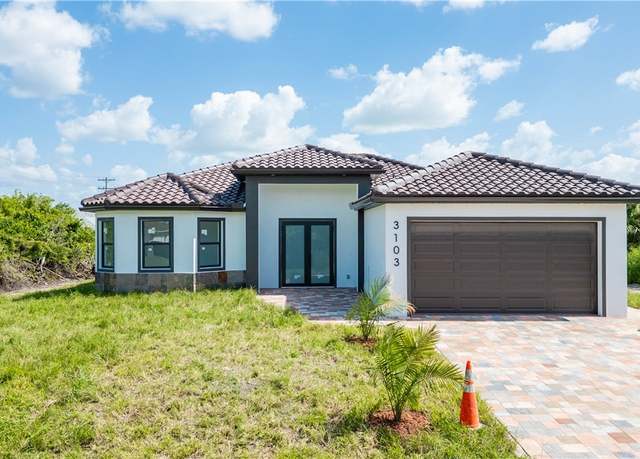 Property at 3103 13th St SW, Lehigh Acres, FL 33976, 4 beds, 2 baths