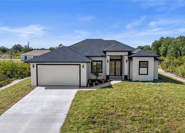 Property at 2705 68th St W, Lehigh Acres, FL 33971, 3 beds, 3 baths