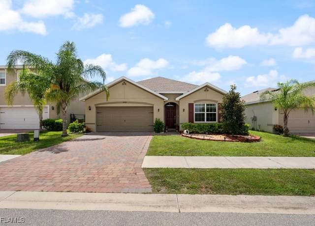 Property at 10563 Crossback Ln, Lehigh Acres, FL 33936, 4 beds, 2 baths
